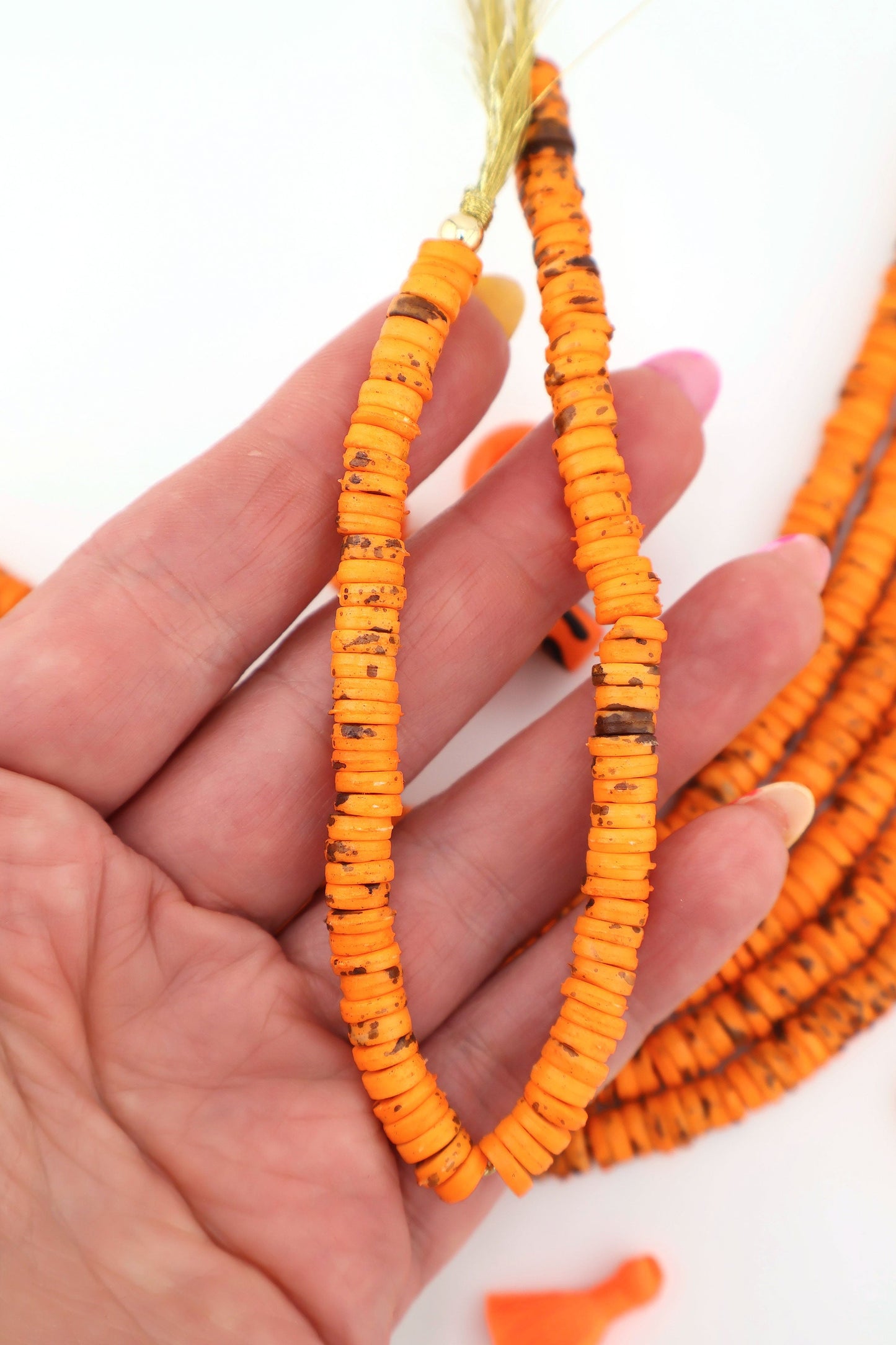 7mm Heishi Orange Speckled Bone Beads: Disc Spacers, 95 beads