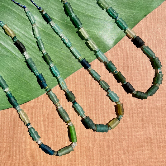 Roman Glass Carved Bead Strands