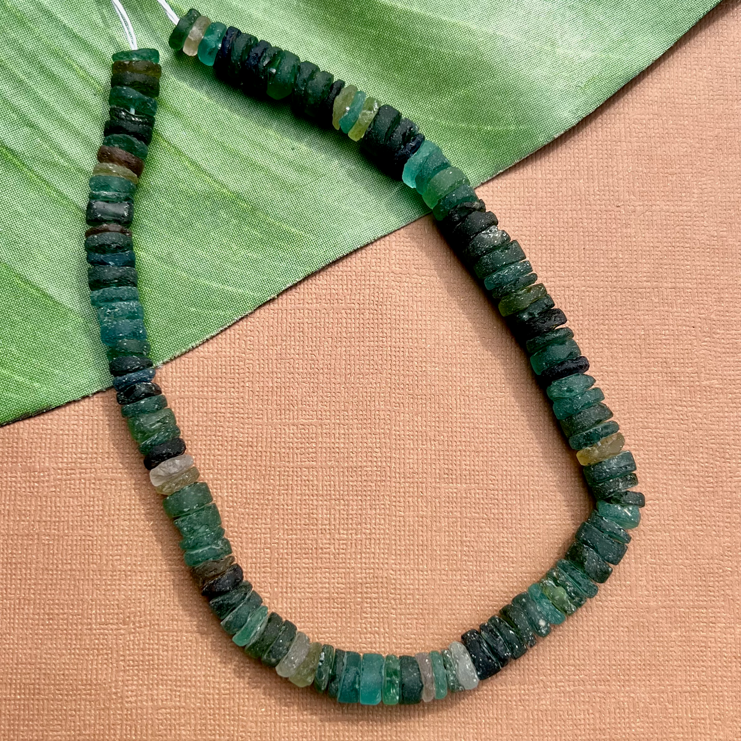 Roman Glass 9mm to 11mm Cylinder Bead Strands