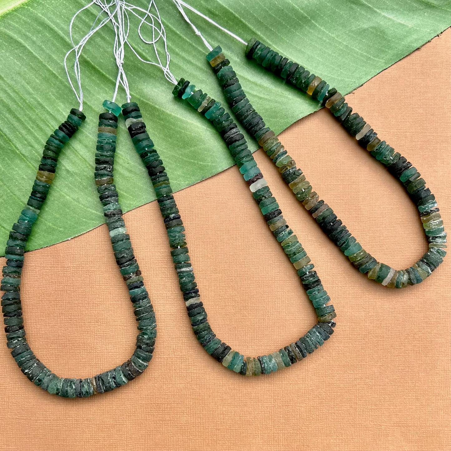 Roman Glass 9mm to 11mm Cylinder Bead Strands