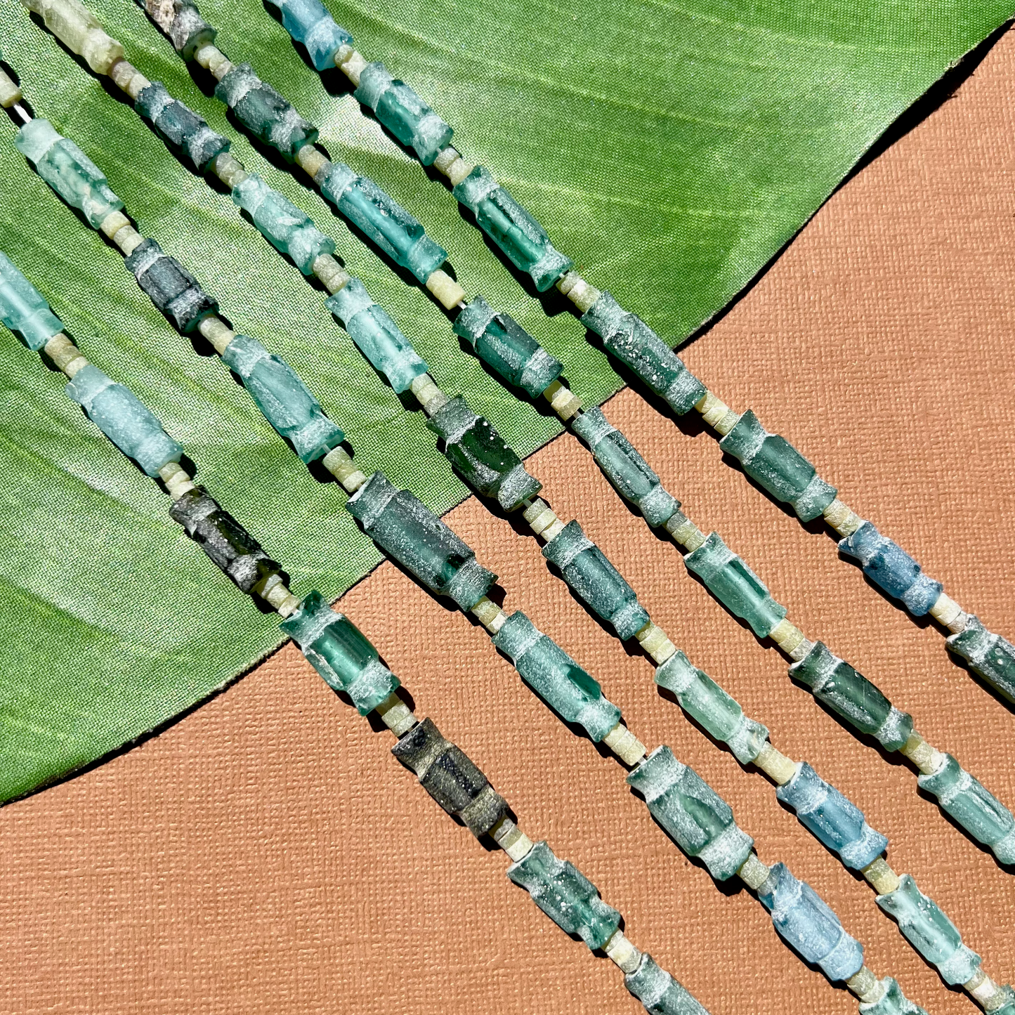 Roman Glass Carved Bead Strands