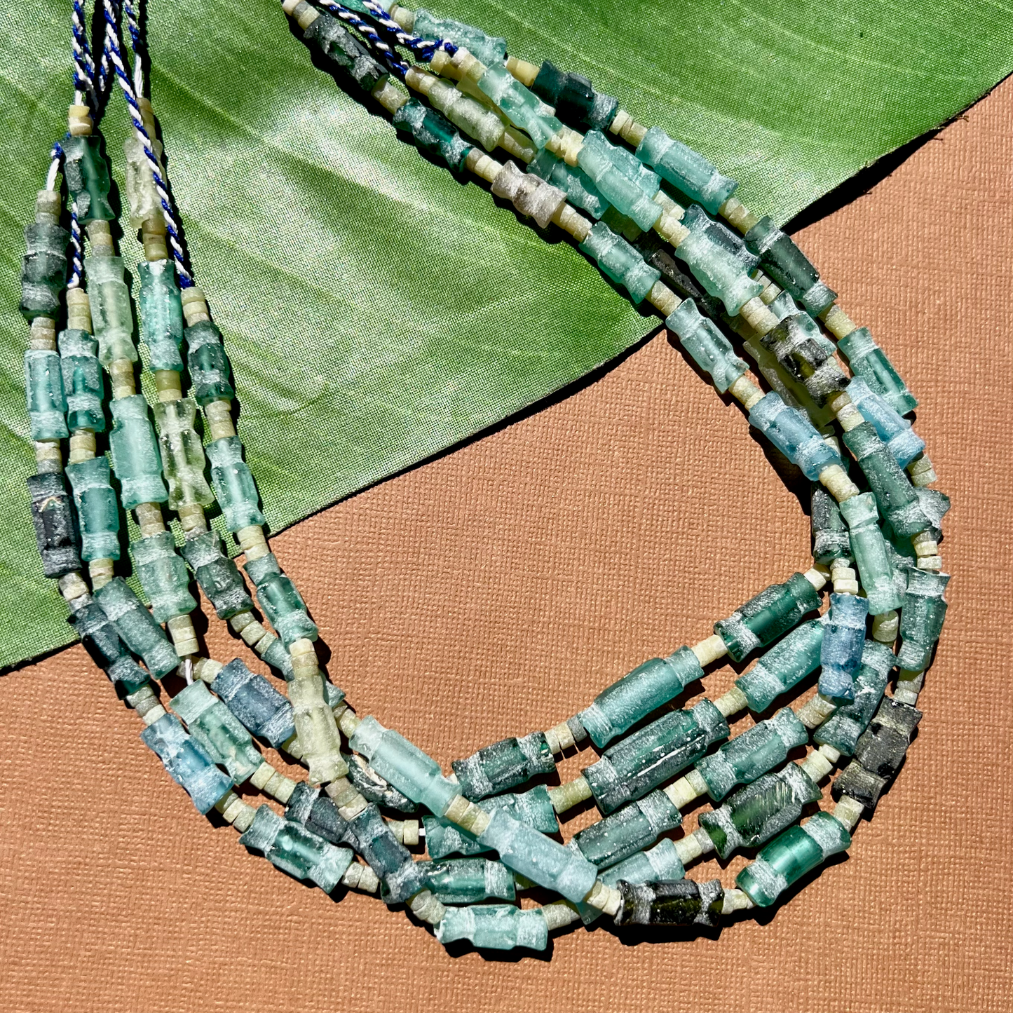 Roman Glass Carved Bead Strands