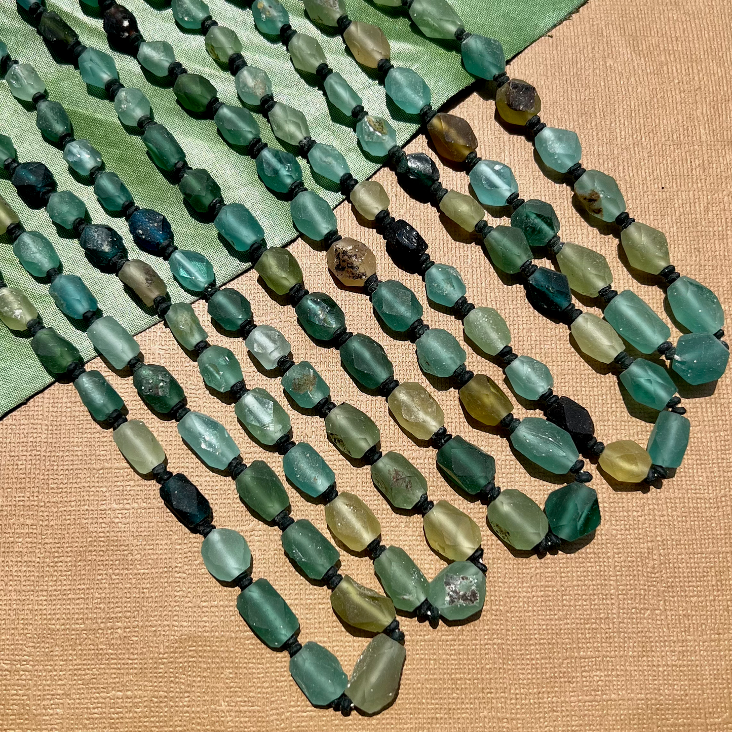 Roman Glass Faceted Bead Strands