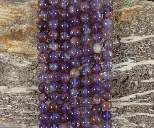 Auralite 23 aka Amethyst w/ Hematite Inclusions Round