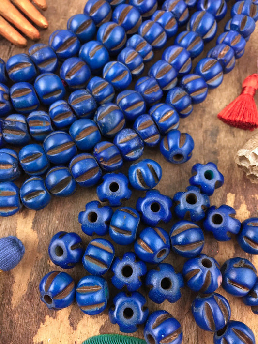 Blue Melon: Indigo Hand Carved Bone Beads, 7x9mm, 25 pieces