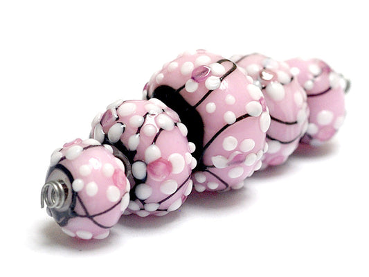 10110011 - Five Cherry Blossom Graduated Rondelle Beads
