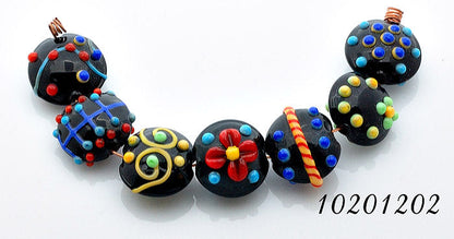 10201202 - Seven Black Based Fiesta Lentil Beads