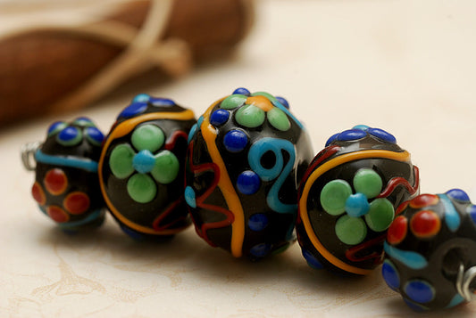 10201211 - Five Graduated Black Based Fiesta Rondelle Beads