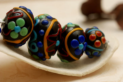 10201211 - Five Graduated Black Based Fiesta Rondelle Beads