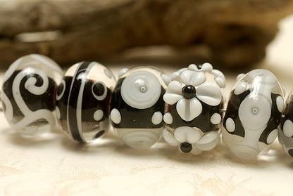 10202101 - Seven Black & White Rondelle Beads
