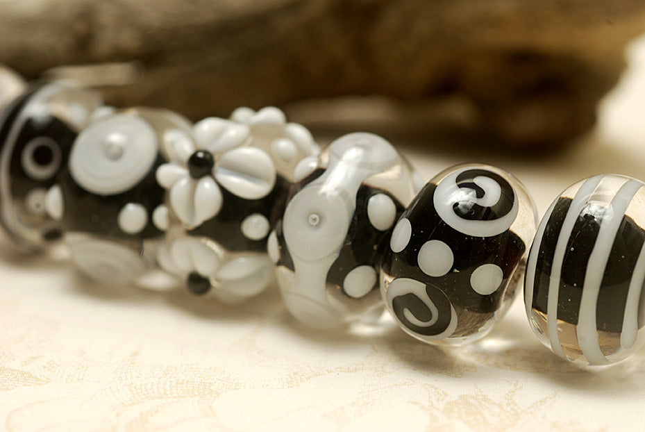 10202101 - Seven Black & White Rondelle Beads