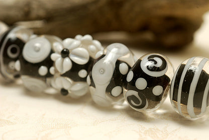 10202101 - Seven Black & White Rondelle Beads