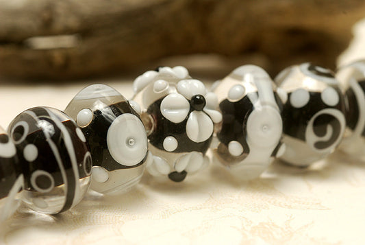 10202101 - Seven Black & White Rondelle Beads