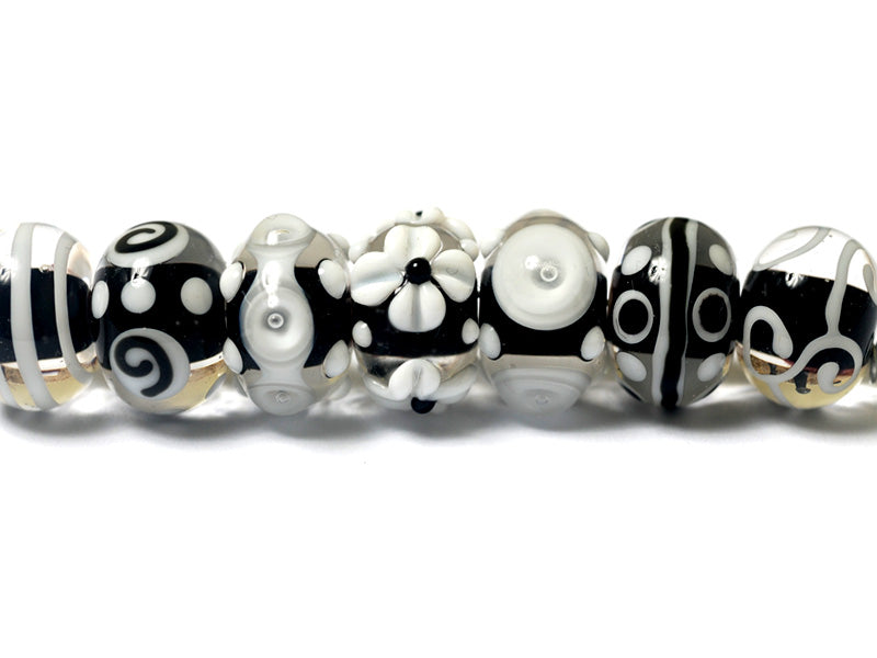 10202101 - Seven Black & White Rondelle Beads