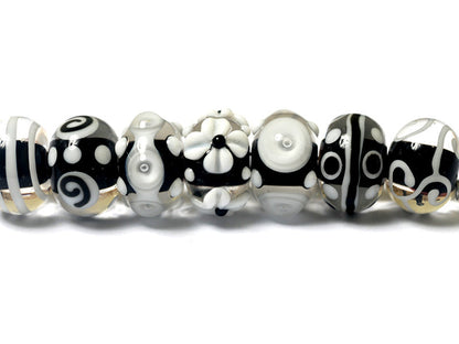 10202101 - Seven Black & White Rondelle Beads