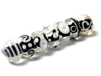 10202101 - Seven Black & White Rondelle Beads