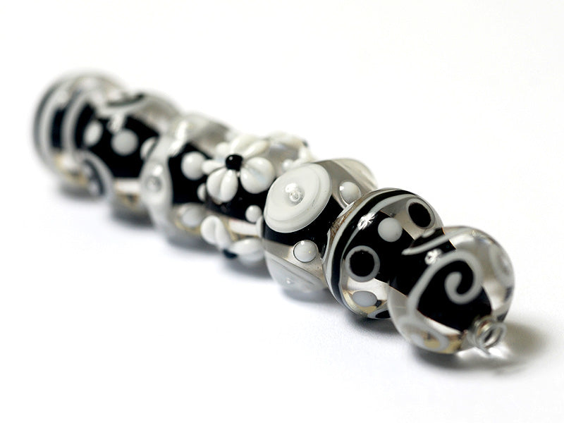 10202101 - Seven Black & White Rondelle Beads