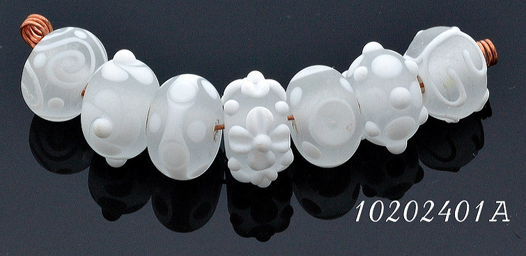 10204001 - Seven Baby Floral White Rondelle Beads