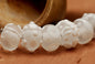 10204001 - Seven Baby Floral White Rondelle Beads