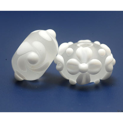 10204001 - Seven Baby Floral White Rondelle Beads