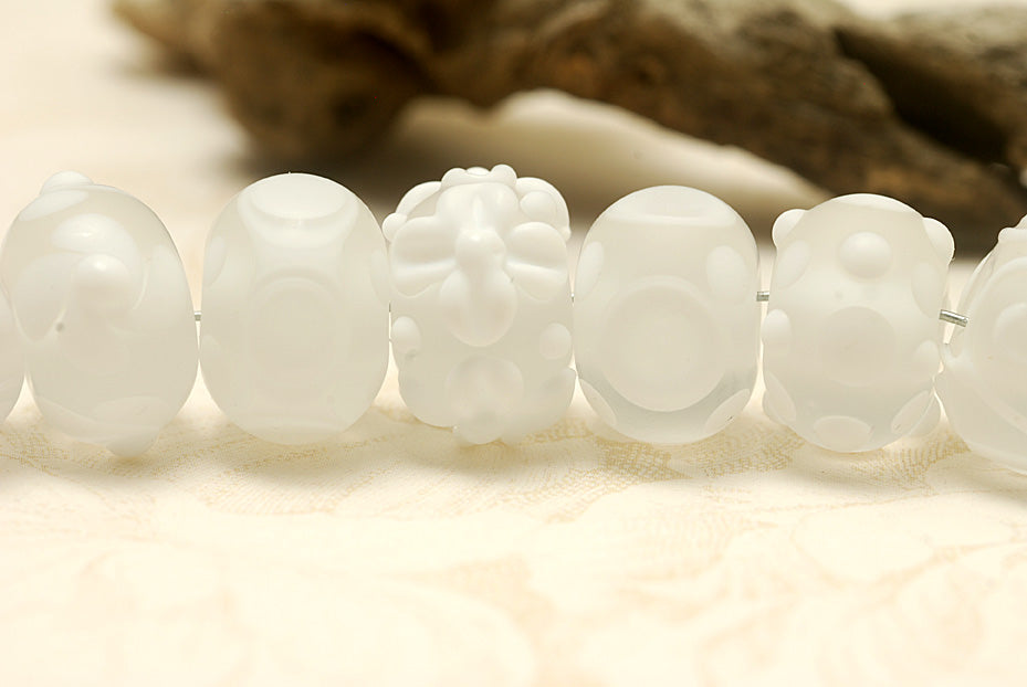 10204001 - Seven Baby Floral White Rondelle Beads