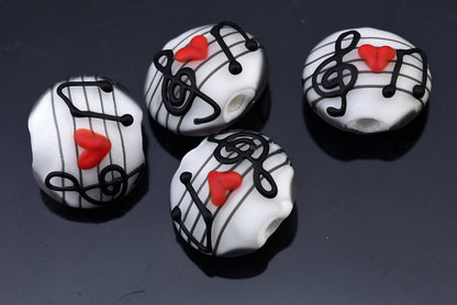 10205612 - Four Musical Love Notes Lentil Beads