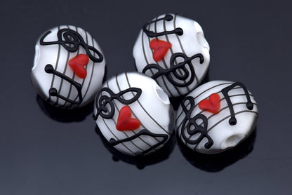 10205612 - Four Musical Love Notes Lentil Beads