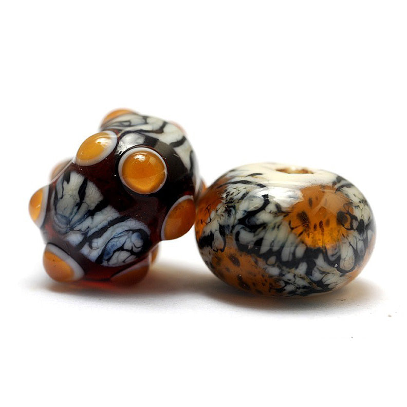 10302601 - Seven Animal Print Rondelle Beads