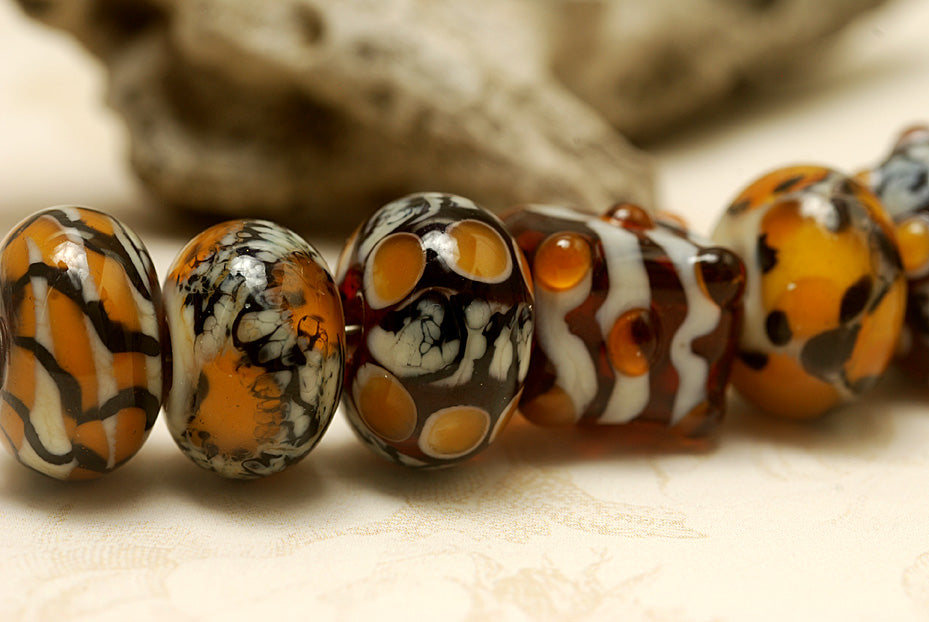 10302601 - Seven Animal Print Rondelle Beads