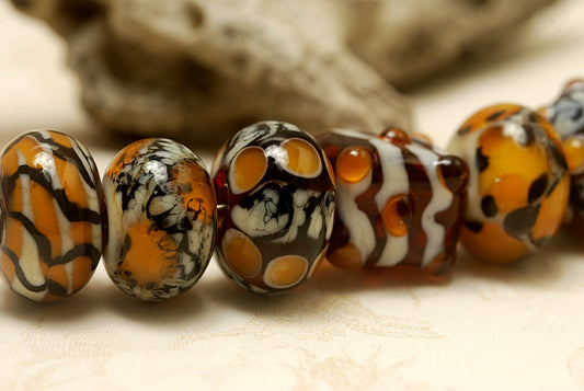 10302601 - Seven Animal Print Rondelle Beads