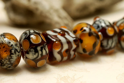 10302601 - Seven Animal Print Rondelle Beads