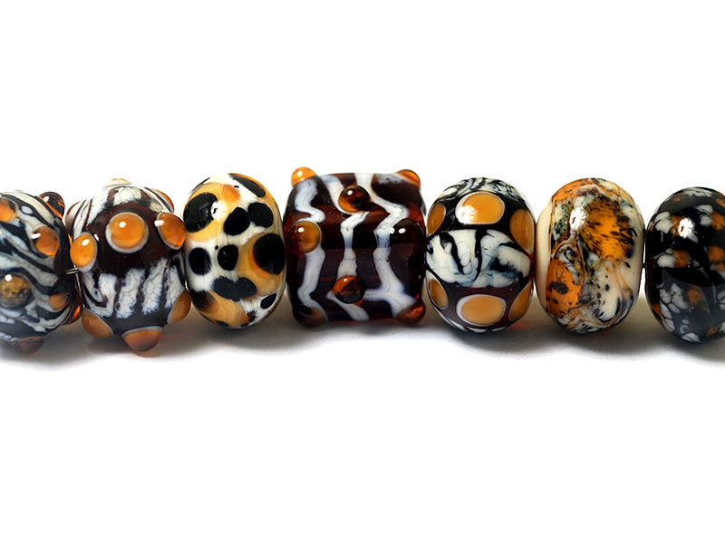 10302601 - Seven Animal Print Rondelle Beads