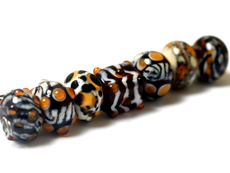 10302601 - Seven Animal Print Rondelle Beads