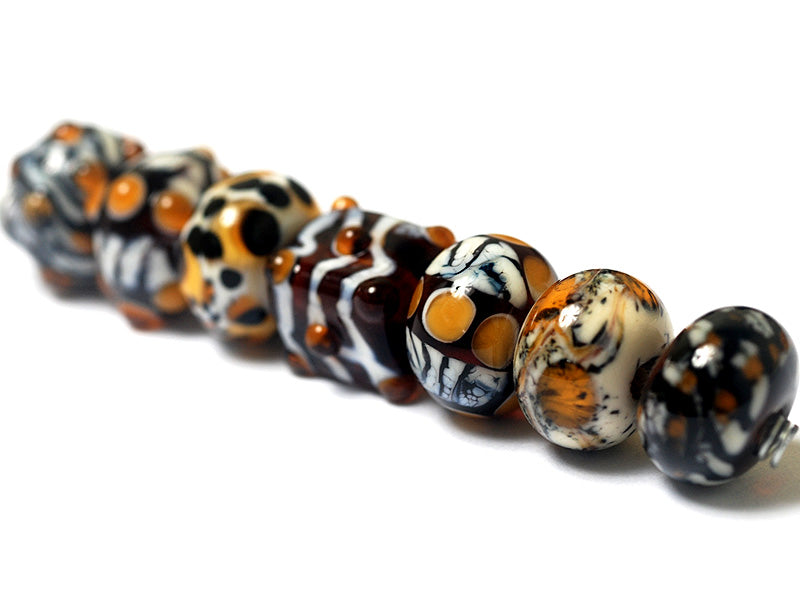 10302601 - Seven Animal Print Rondelle Beads