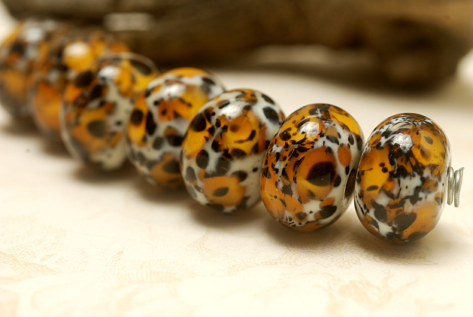 10304301 - Seven Animal Prints Rondelle Beads