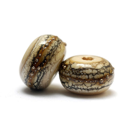 10306001 - Seven Dark Ivory w/Silver Rondelle Beads