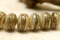 10306001 - Seven Dark Ivory w/Silver Rondelle Beads