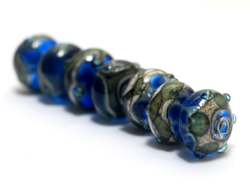 10406501 - Seven Deep Blue Ocean Rondelle Beads