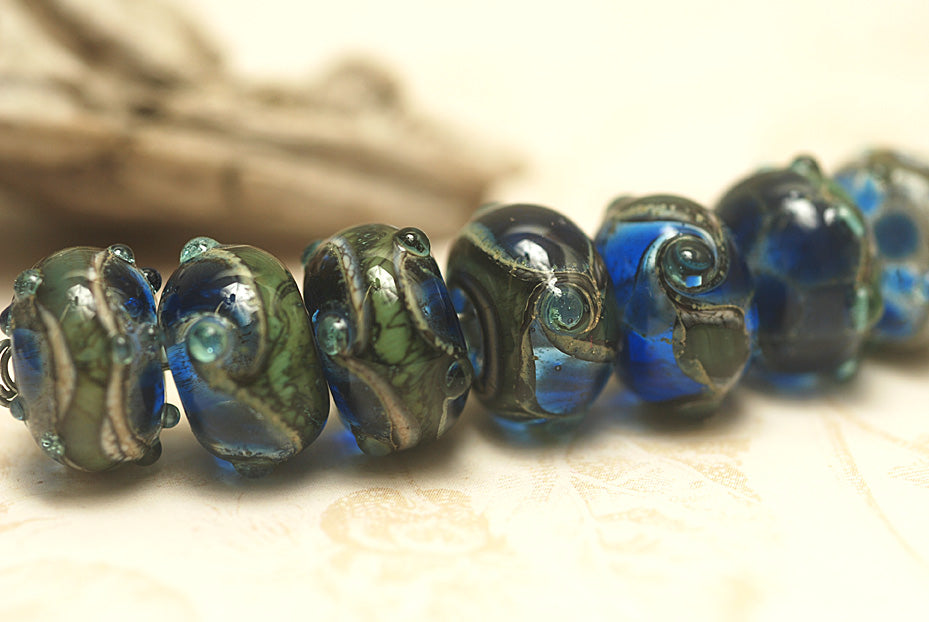 10406501 - Seven Deep Blue Ocean Rondelle Beads
