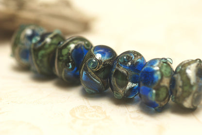 10406501 - Seven Deep Blue Ocean Rondelle Beads