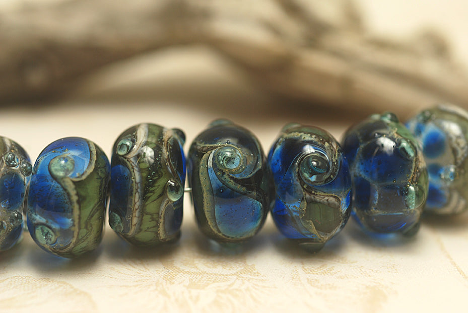 10406501 - Seven Deep Blue Ocean Rondelle Beads