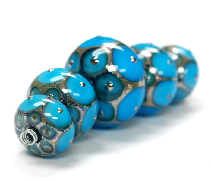 10409011 - Five Teal Blue w/Metal Dots Graduated Rondelle Beads