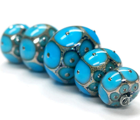 10409011 - Five Teal Blue w/Metal Dots Graduated Rondelle Beads