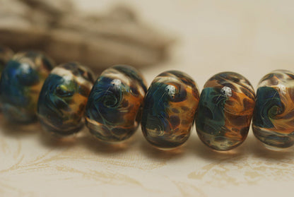 10409301 - Seven Blue & Orange Boro Rondelle Beads