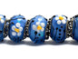 10414201 - Seven Arctic Blue Florals Rondelle Beads