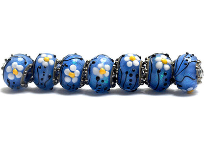 10414201 - Seven Arctic Blue Florals Rondelle Beads