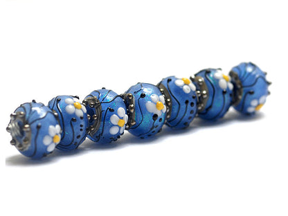 10414201 - Seven Arctic Blue Florals Rondelle Beads