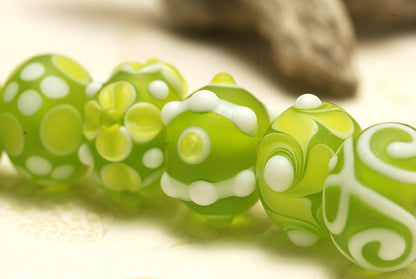 10500401 - Seven Baby Spring Green Rondelle Beads
