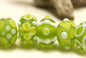 10500401 - Seven Baby Spring Green Rondelle Beads