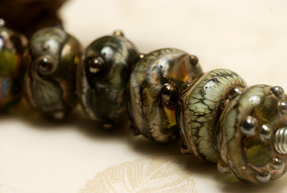 10503401 - Seven Green w/Silver Foil Rondelle Beads